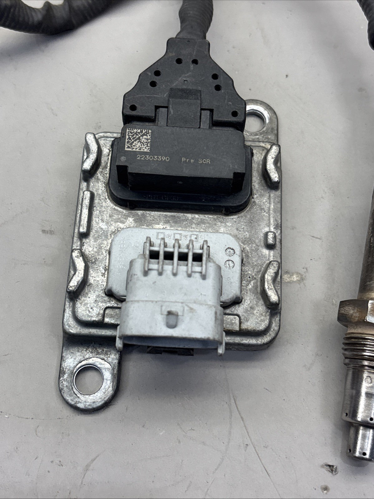 Genuine Volvo VNL FH D13 NOx Sensor with Mounting Bracket - OEM 22303390